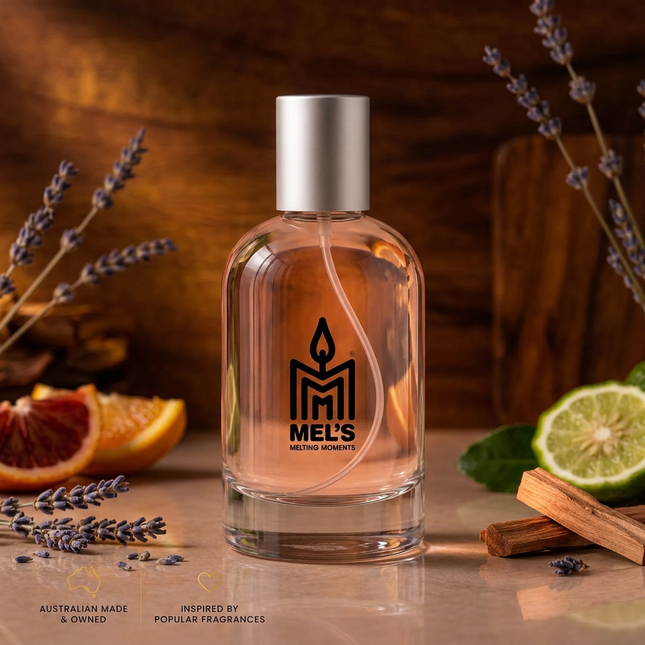 Fahrenheit Type eau de toilette 100ml bottle with the Mel's Melting Moments logo, keeping the original liquid colour, with lavender, citrus and wood accents on a warm moody background