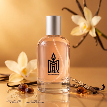 Kayali Vanilla 28 Type eau de toilette 100ml bottle with the Mel's Melting Moments logo, keeping the original liquid colour, with vanilla orchids, vanilla pods and amber accents on a warm golden background