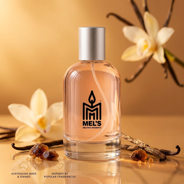 Kayali Vanilla 28 Type eau de toilette 100ml bottle with the Mel's Melting Moments logo, keeping the original liquid colour, with vanilla orchids, vanilla pods and amber accents on a warm golden background